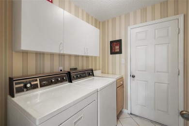 FANTASTIC, 3/2 home with EXPANSIVE ENCLOSED LANAI and REAR PATIO on Plantation Golf Club in Florida - for sale on GolfHomes.com, golf home, golf lot