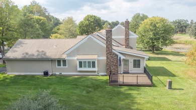 Incredible and updated Trapper Woods condo, nestled in the on Canadian Lakes Country Club-The Pines Course in Michigan - for sale on GolfHomes.com, golf home, golf lot
