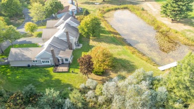 Incredible and updated Trapper Woods condo, nestled in the on Canadian Lakes Country Club-The Pines Course in Michigan - for sale on GolfHomes.com, golf home, golf lot