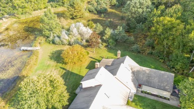 Incredible and updated Trapper Woods condo, nestled in the on Canadian Lakes Country Club-The Pines Course in Michigan - for sale on GolfHomes.com, golf home, golf lot