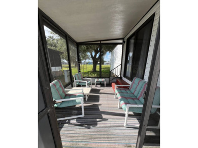 Charming 2-bedroom home in highly sought after Hidden Golf on Lake Henry Golf Club in Florida - for sale on GolfHomes.com, golf home, golf lot