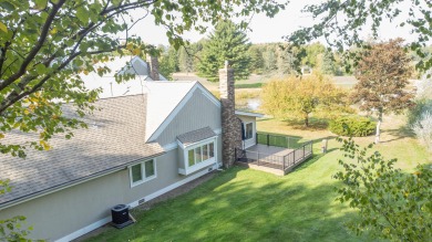 Incredible and updated Trapper Woods condo, nestled in the on Canadian Lakes Country Club-The Pines Course in Michigan - for sale on GolfHomes.com, golf home, golf lot