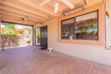 Welcome to this meticulously updated home in the Cove, located on Voyager RV Resort and Golf Course in Arizona - for sale on GolfHomes.com, golf home, golf lot