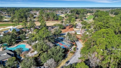 Design your dream home on this spacious corner wooded lot in the on Berkeley Hall Golf Club in South Carolina - for sale on GolfHomes.com, golf home, golf lot