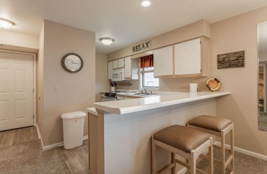 Discover resort-style living in this beautiful  2-bedroom on Pointe Royale Village Country Club in Missouri - for sale on GolfHomes.com, golf home, golf lot