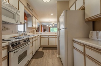Discover resort-style living in this beautiful  2-bedroom on Pointe Royale Village Country Club in Missouri - for sale on GolfHomes.com, golf home, golf lot