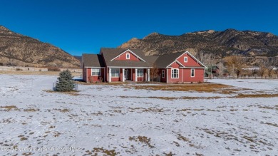 Nestled on over 2 acres of picturesque land, this custom-built on Rifle Creek Golf Course in Colorado - for sale on GolfHomes.com, golf home, golf lot