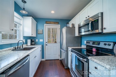 Welcome to 412 Masters View Drive, a welcoming 3-bedroom, 2-bath on Etowah Valley Golf Club in North Carolina - for sale on GolfHomes.com, golf home, golf lot