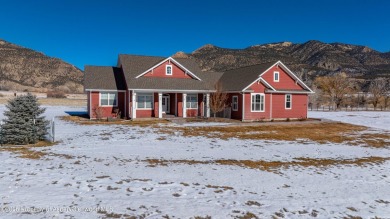 Nestled on over 2 acres of picturesque land, this custom-built on Rifle Creek Golf Course in Colorado - for sale on GolfHomes.com, golf home, golf lot