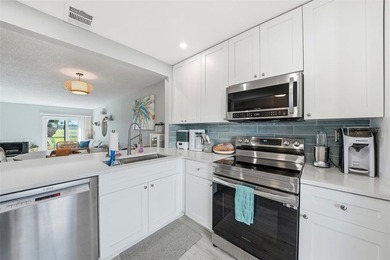 ALL AGES & ANIMAL FRIENDLY! This amazing, one of a kind on Isla Del Sol Yacht and Country Club in Florida - for sale on GolfHomes.com, golf home, golf lot