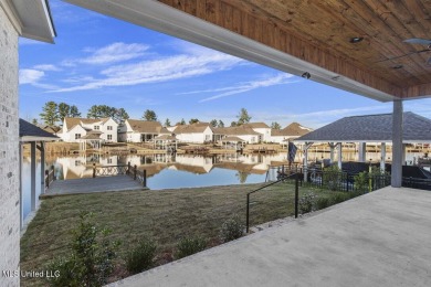 Beautiful new construction waterfront home in Lake Caroline of on Lake Caroline Golf Club in Mississippi - for sale on GolfHomes.com, golf home, golf lot