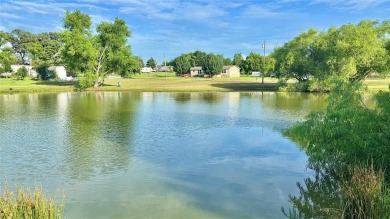 Nestled on a peaceful lot that backs to a well-stocked fishing on Links At Lands End in Texas - for sale on GolfHomes.com, golf home, golf lot