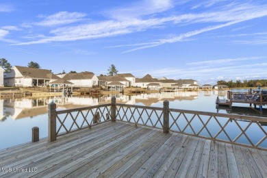Step inside this beautifully designed new construction lakefront on Lake Caroline Golf Club in Mississippi - for sale on GolfHomes.com, golf home, golf lot