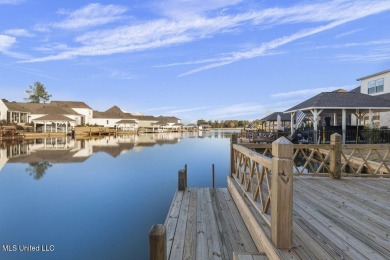 Step inside this beautifully designed new construction lakefront on Lake Caroline Golf Club in Mississippi - for sale on GolfHomes.com, golf home, golf lot