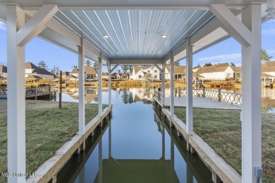 Step inside this beautifully designed new construction lakefront on Lake Caroline Golf Club in Mississippi - for sale on GolfHomes.com, golf home, golf lot