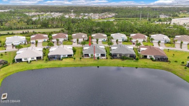 GORGEOUS POND VIEW ALONG WITH DESIGNER FINISHES IN THIS ANTIGUA on LPGA International Golf Course in Florida - for sale on GolfHomes.com, golf home, golf lot