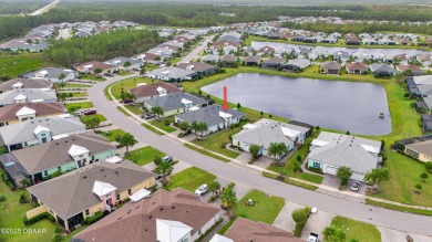 GORGEOUS POND VIEW ALONG WITH DESIGNER FINISHES IN THIS ANTIGUA on LPGA International Golf Course in Florida - for sale on GolfHomes.com, golf home, golf lot