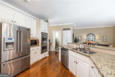 Nestled on a quiet cul-de-sac in the heart of Windward, this on The Golf Club of Georgia in Georgia - for sale on GolfHomes.com, golf home, golf lot