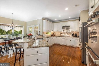 Nestled on a quiet cul-de-sac in the heart of Windward, this on The Golf Club of Georgia in Georgia - for sale on GolfHomes.com, golf home, golf lot