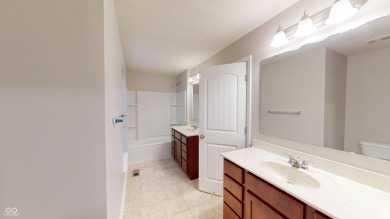 Impeccable brick ranch with a basement in prestigious Hickory on Hickory Stick Golf Club in Indiana - for sale on GolfHomes.com, golf home, golf lot