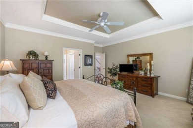 Nestled on a quiet cul-de-sac in the heart of Windward, this on The Golf Club of Georgia in Georgia - for sale on GolfHomes.com, golf home, golf lot