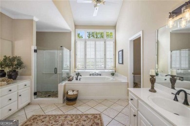 Nestled on a quiet cul-de-sac in the heart of Windward, this on The Golf Club of Georgia in Georgia - for sale on GolfHomes.com, golf home, golf lot