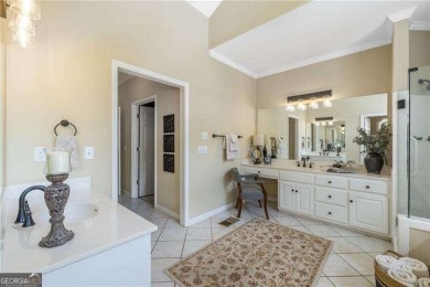 Nestled on a quiet cul-de-sac in the heart of Windward, this on The Golf Club of Georgia in Georgia - for sale on GolfHomes.com, golf home, golf lot