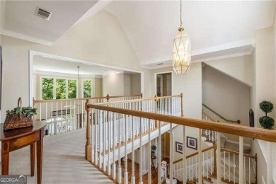 Nestled on a quiet cul-de-sac in the heart of Windward, this on The Golf Club of Georgia in Georgia - for sale on GolfHomes.com, golf home, golf lot