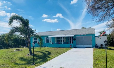 Enjoy the Florida lifestyle in this 3 bedroom, 2 bathroom one on Port Charlotte Golf Club in Florida - for sale on GolfHomes.com, golf home, golf lot