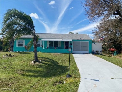 Enjoy the Florida lifestyle in this 3 bedroom, 2 bathroom one on Port Charlotte Golf Club in Florida - for sale on GolfHomes.com, golf home, golf lot