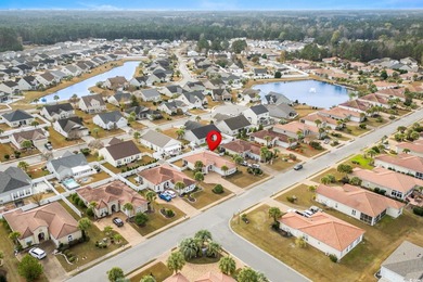 Welcome to this charming Mediterranean-style home located in the on Palmetto Greens Golf and Country Club in South Carolina - for sale on GolfHomes.com, golf home, golf lot