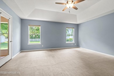 Tucked on a private 1.3-acre lot with no neighbor directly on Jacksonville Beach Golf Course in Florida - for sale on GolfHomes.com, golf home, golf lot
