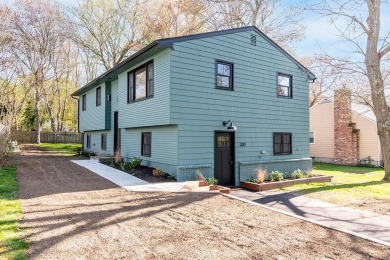 This beautifully renovated home has been completely remodeled to on Warwick Country Club in Rhode Island - for sale on GolfHomes.com, golf home, golf lot