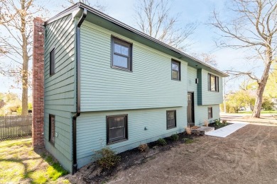 This beautifully renovated home has been completely remodeled to on Warwick Country Club in Rhode Island - for sale on GolfHomes.com, golf home, golf lot