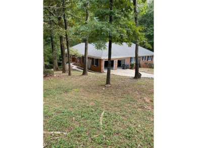 Discover a rare gem in the sought-after Pine Ridge Country Club on Collins Hill Golf Club in Georgia - for sale on GolfHomes.com, golf home, golf lot