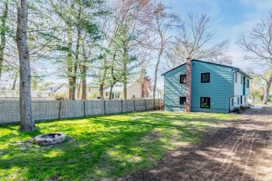 This beautifully renovated home has been completely remodeled to on Warwick Country Club in Rhode Island - for sale on GolfHomes.com, golf home, golf lot