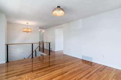 This beautifully renovated home has been completely remodeled to on Warwick Country Club in Rhode Island - for sale on GolfHomes.com, golf home, golf lot