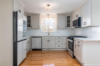 This beautifully renovated home has been completely remodeled to on Warwick Country Club in Rhode Island - for sale on GolfHomes.com, golf home, golf lot