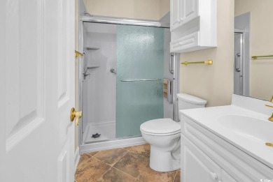 Must see! This stunning first-floor, 2-bedroom, 2-bathroom end on Myrtlewood Golf Course and Club  in South Carolina - for sale on GolfHomes.com, golf home, golf lot
