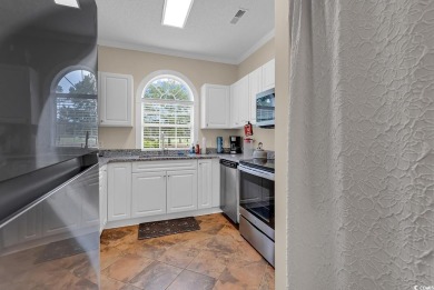 Must see! This stunning first-floor, 2-bedroom, 2-bathroom end on Myrtlewood Golf Course and Club  in South Carolina - for sale on GolfHomes.com, golf home, golf lot