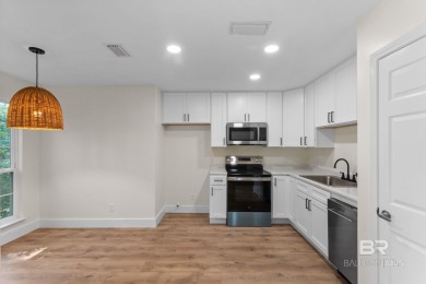 FULLY RENOVATED & Ready to Go! This updated Lake Forest townhome on Lake Forest Yacht and Country Club in Alabama - for sale on GolfHomes.com, golf home, golf lot