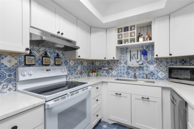 Step into this beautifully detailed 2-bedroom, 2-bath condo on Palm Harbor Golf Club in Florida - for sale on GolfHomes.com, golf home, golf lot