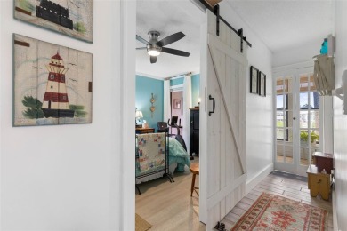 Step into this beautifully detailed 2-bedroom, 2-bath condo on Palm Harbor Golf Club in Florida - for sale on GolfHomes.com, golf home, golf lot