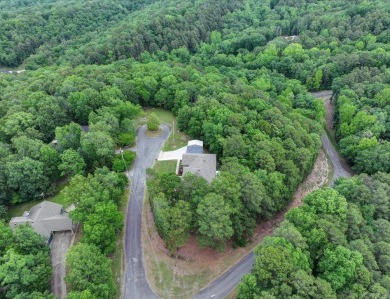 Welcome to this beautifully updated 3-bedroom, 2-bath home on Diamondhead Golf and Country Club in Arkansas - for sale on GolfHomes.com, golf home, golf lot