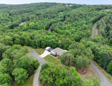 Welcome to this beautifully updated 3-bedroom, 2-bath home on Diamondhead Golf and Country Club in Arkansas - for sale on GolfHomes.com, golf home, golf lot
