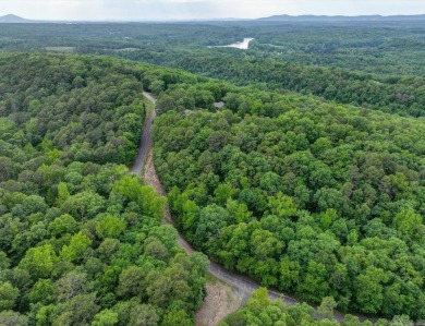 Welcome to this beautifully updated 3-bedroom, 2-bath home on Diamondhead Golf and Country Club in Arkansas - for sale on GolfHomes.com, golf home, golf lot