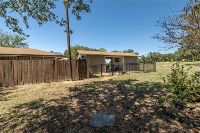 Experience the charm of this delightful 3-BR, 2-bath, 2-car on The Club At Runaway Bay in Texas - for sale on GolfHomes.com, golf home, golf lot