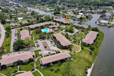 Step into this beautifully detailed 2-bedroom, 2-bath condo on Palm Harbor Golf Club in Florida - for sale on GolfHomes.com, golf home, golf lot