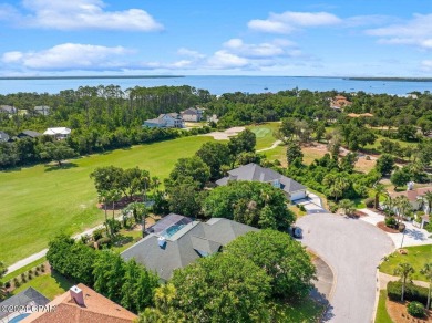 Offered for sale is this 3 bed/2 bath, custom built home located on Bay Point Resort Golf Club in Florida - for sale on GolfHomes.com, golf home, golf lot