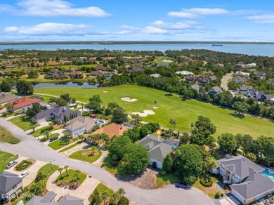 Offered for sale is this 3 bed/2 bath, custom built home located on Bay Point Resort Golf Club in Florida - for sale on GolfHomes.com, golf home, golf lot